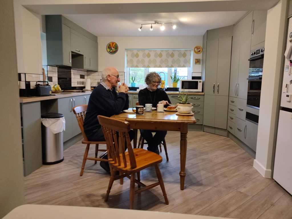 Homeowners in their newly renovate space